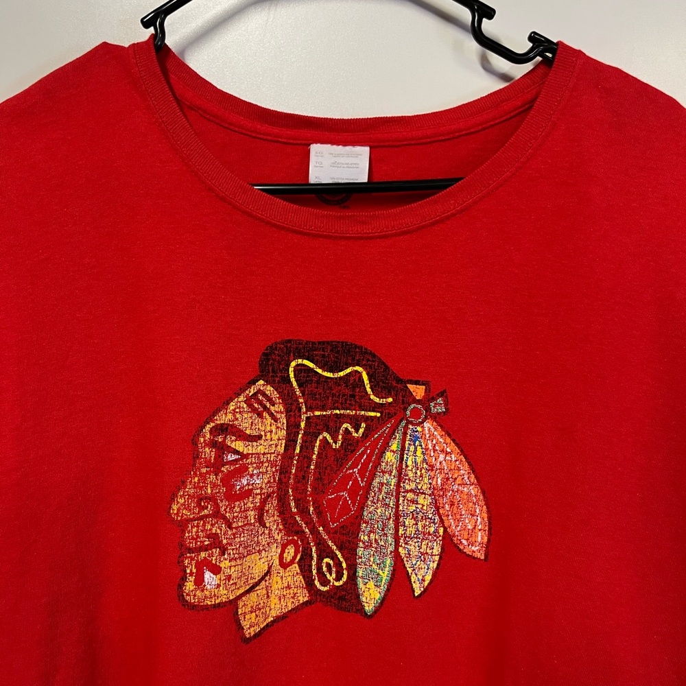 Black Hawk hockey woman’s XL, red t-shirt.